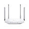 WeiÃŸer Router mit vier grauen Antennen. Das GehÃ¤use hat eine wellenfÃ¶rmige Textur und das Logo von TP-Link ist sichtbar.