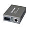 Grauer TP-Link Media Converter mit Beschriftung: TP-LINK, MC100CM, Fast Ethernet Media Converter. Anschlüsse und LEDs.