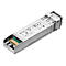 Un émetteur-récepteur SFP+ TP-Link argenté. Des inscriptions sur la surface indiquent le modèle, le fabricant et les certifications.