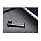 ClÃ© USB argentÃ©e avec logo 'Transcend' et impression 25 Go, posÃ©e sur une surface texturÃ©e.