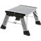 Folding step stool made of aluminum. Silver step surface, black plastic feet.