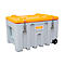 Grey transport box with an orange lid and wheels. It features two clasps and a Cemo logo.