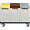 Three bins with yellow, brown, and gray lids stand on a trolley.