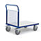 Blue, rectangular transport cart with four gray wheels, white loading area and wire mesh.