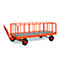 An orange transport cart with protective grille and four wheels, against a white background.