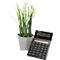 Black calculator and potted plant with white flowers on a white background.
