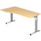 A height-adjustable desk made of light-colored wood with a silver frame. The tabletop is curved.