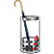 A silver umbrella stand contains a blue umbrella and a red walking stick.