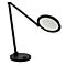 Schwarze, minimalistische Schreibtischlampe mit rundem Leuchtkopf auf weißem Hintergrund.