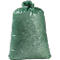 Green garbage bag, filled with garden waste, tied at the top.