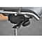 Close-up of a black office chair with chrome metal arms and controls.