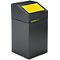 Conteneur noir en forme de cube avec surface jaune. Haut : affichage jaune. Logo : SCHÄFERSHOP.