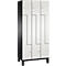 Une haute armoire blanche avec des accents noirs, des pieds et un design frontal unique.
