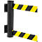 Black pillar with a yellow and black striped barrier tape.
