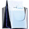 Transparent brochure holder with "Cafe Central" lettering. Blue swirls are depicted on light paper.