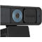 Close-up van een zwarte Kensington webcam met lens, logo en bevestiging.