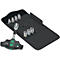 Kit d'outils avec cliquet et divers accessoires, rangés dans un sac noir.