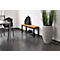 Hallway featuring a bench, chair, pot with tall grass, and shoes.