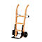 Wooden hand truck with black wheels. Two curved handles, two wheels and a loading surface.