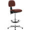 An office chair with a red seat and backrest, height adjustable. Chrome base with footrest.