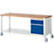 Workbench with wooden top, blue drawers and castors. Shelf below, white frame.