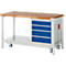 Workbench with wooden top, four drawers, and castors. Drawers are blue. Workbench has white metal construction.
