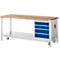 Workbench with wooden top and blue drawers. The workbench stands on castors.