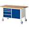Workbench with wheels, wooden top, blue drawers, and cabinet door.