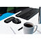 Desk with keyboard, mouse, wrist rest, notepad and coffee cup. Workplace in the office.