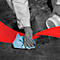 Person in protective suit wipes with blue cloth on gray ground. Red stripe frames the image.