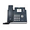 Dunkelgraues Yealink IP-Telefon mit Display, Ziffernblock und Hörer vor weißem Hintergrund.