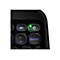 Gros plan sur un clavier noir avec une illumination verte autour du bouton d'alimentation. Logo ZAGG en haut.