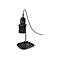 Lecteur de codes-barres noir avec support sur fond blanc. Inscription Zebra en haut.