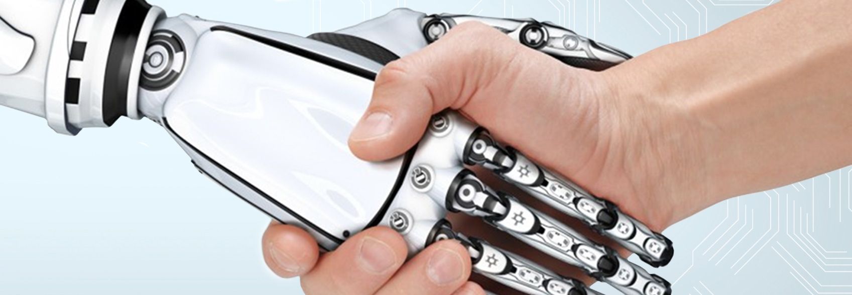 Eine menschliche Hand schüttelt eine Roboterhand