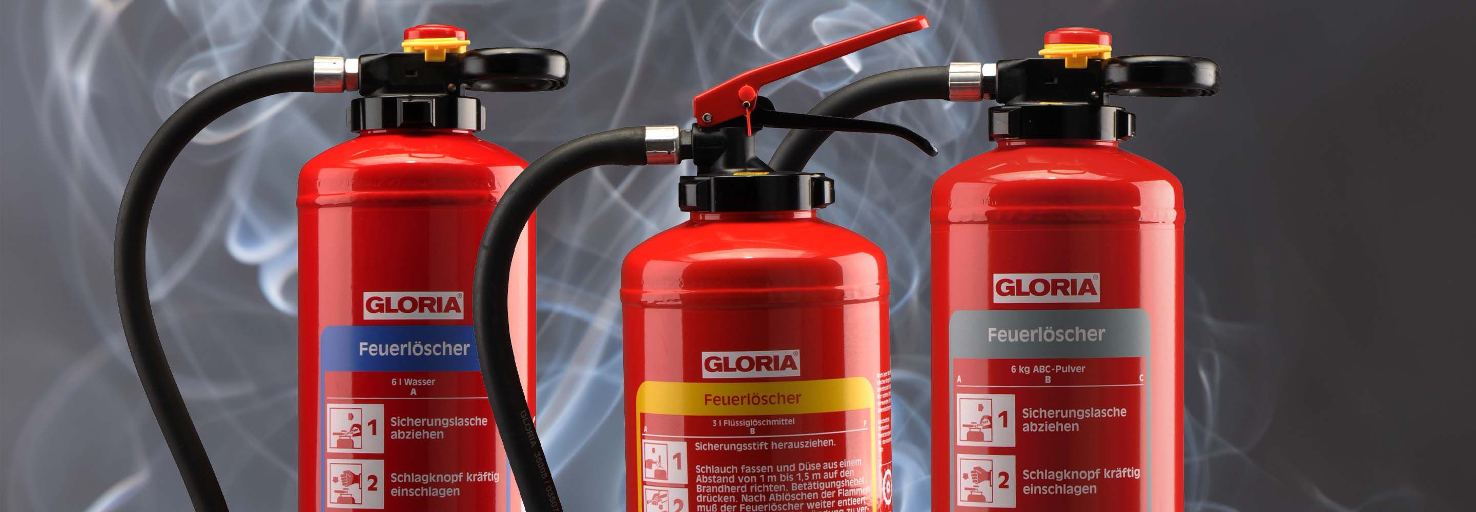 Drei Feuerlöscherarten für verschiedene Brandklassen