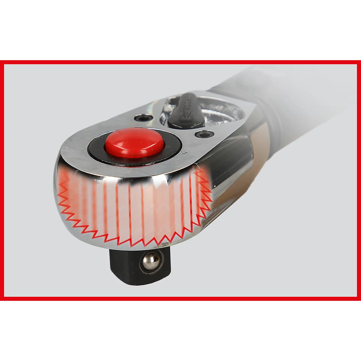 Detailaufnahme eines Schraubenschlüssels, der rote Knopf und die Zahnstruktur sind hervorgehoben.