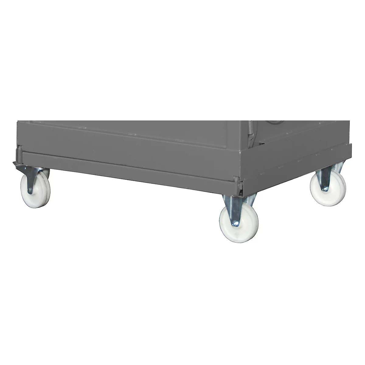 Primer plano de cuatro ruedas blancas debajo de un armario gris. Las ruedas están montadas en metal.