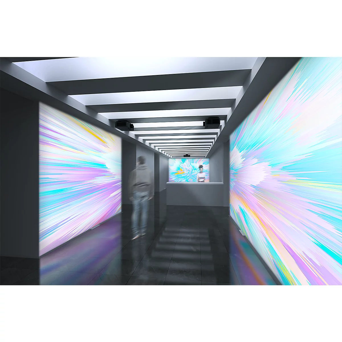 A hallway with colorful, illuminated screens. A person walks by. A counter at the end.