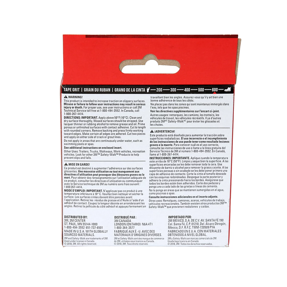 Gros plan sur une boîte en carton rouge avec du texte blanc contenant des informations et des instructions sur le produit.