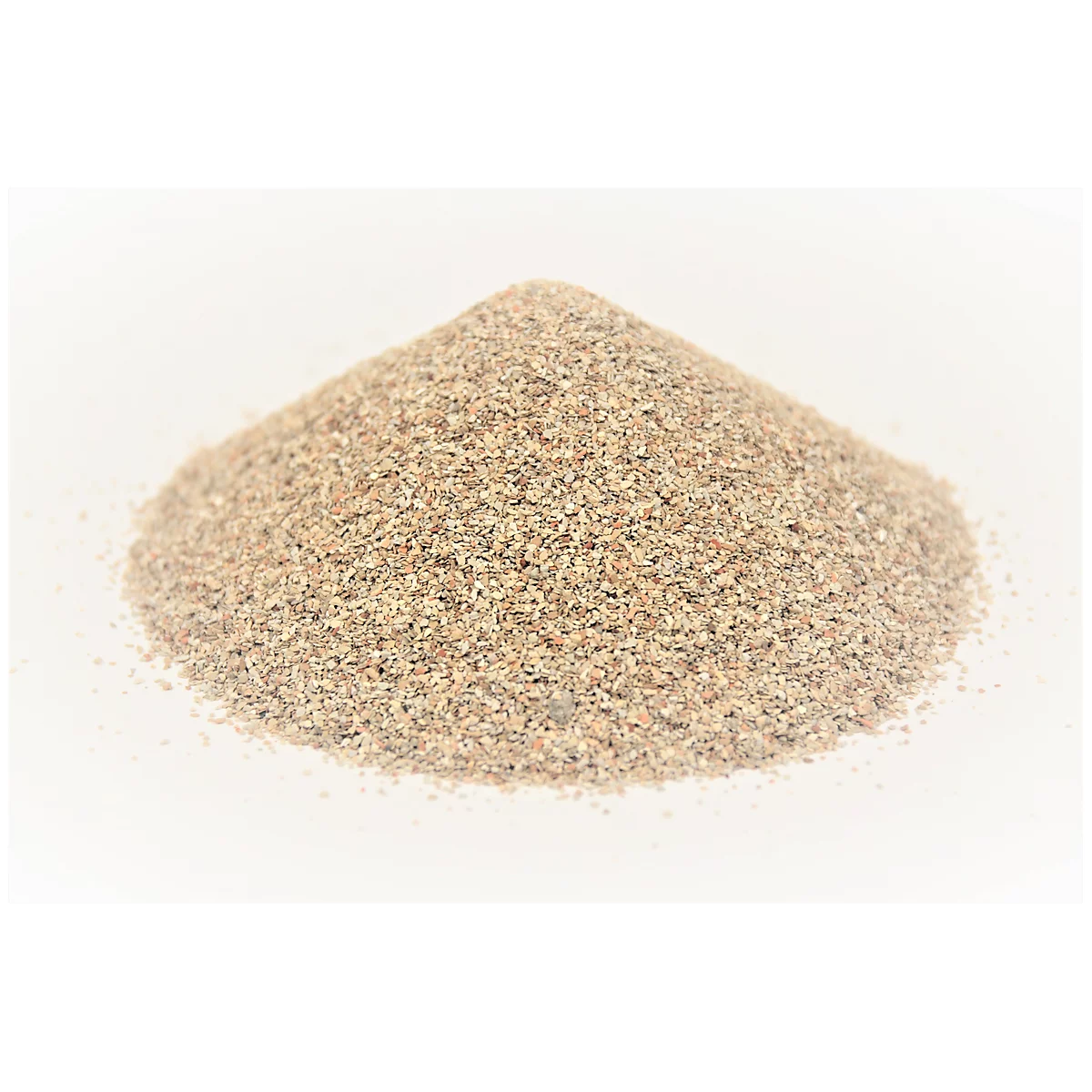 A pile of fine, sand-colored grains against a bright background.