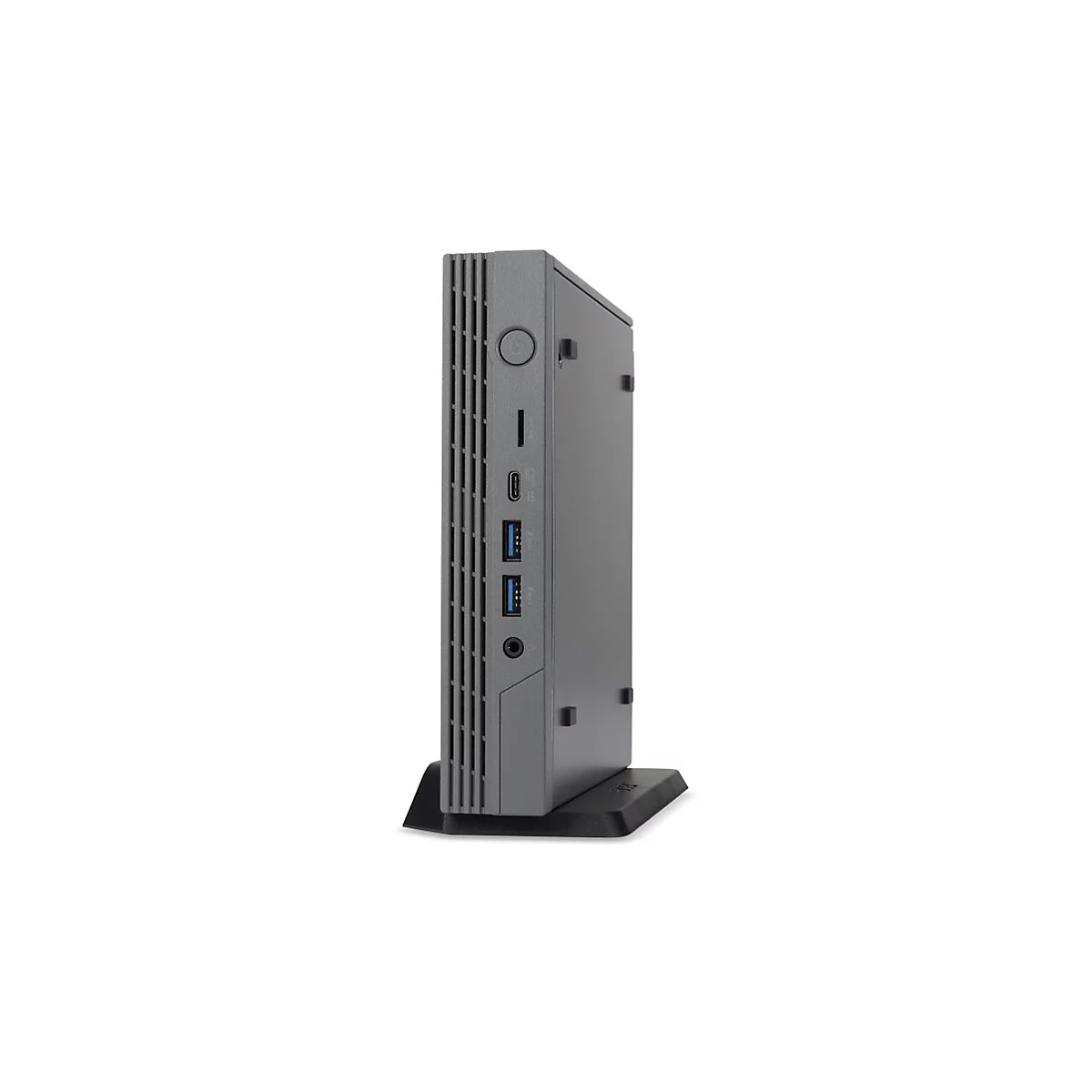 Grauer Mini-PC von der Seite. Das GerÃ¤t steht auf einem StÃ¤nder. Auf der Vorderseite sind AnschlÃ¼sse zu sehen.