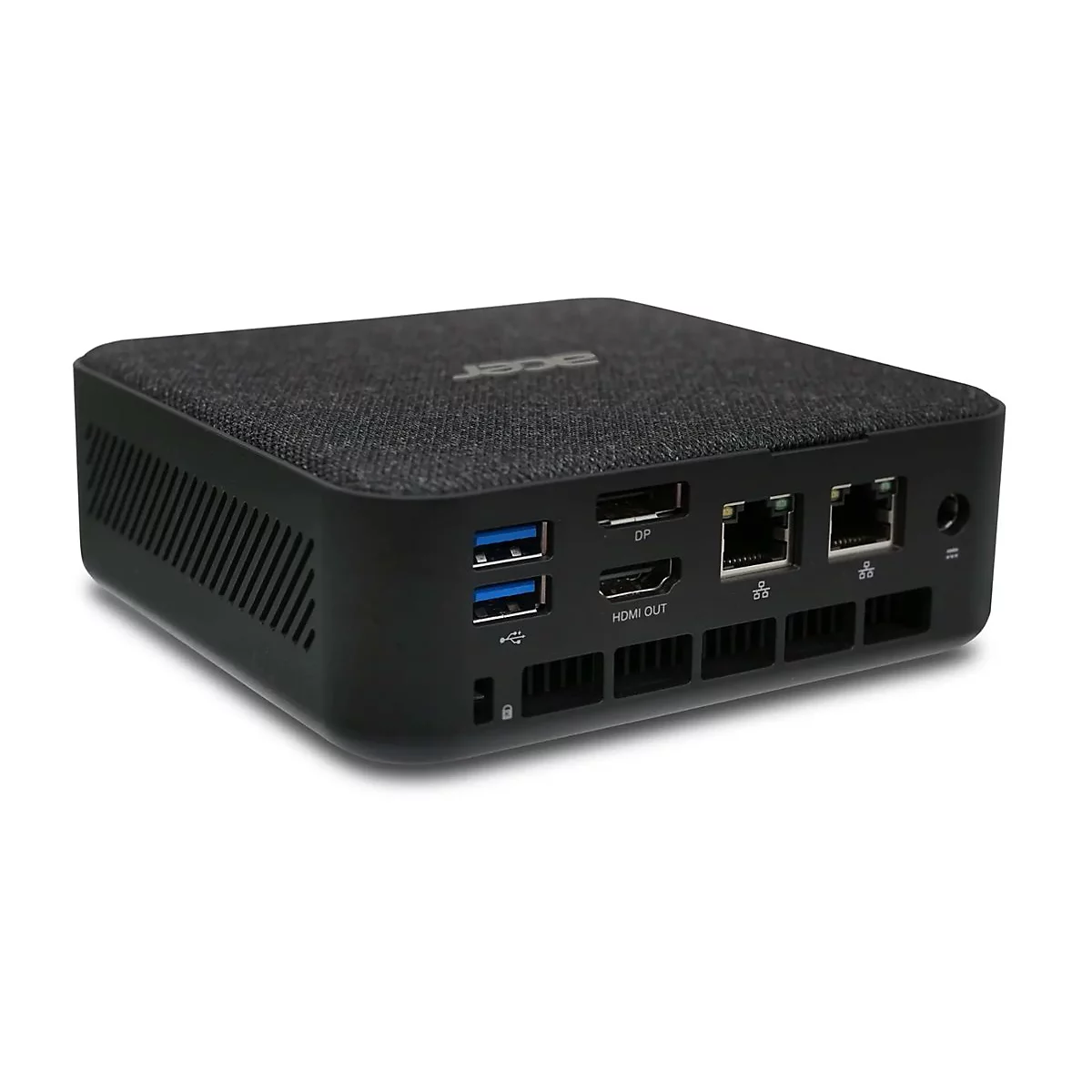 Schwarzer Mini-PC von Acer. Oberseite mit Stoffmuster, Anschlüsse auf der Rückseite, darunter HDMI und DP.