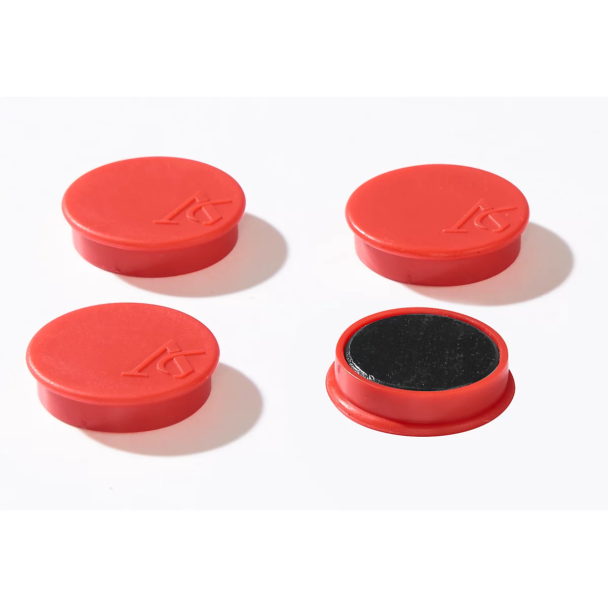 Four red, round magnets on a white background. One is open, showing a black felt. Each has a logo.