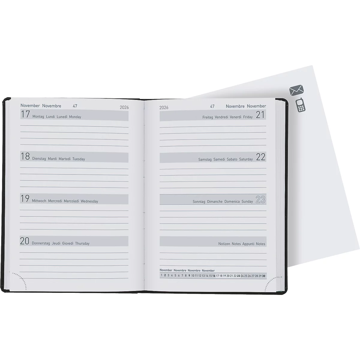 Carnet noir ouvert avec des pages de calendrier, à côté duquel se trouve une feuille blanche avec des symboles.