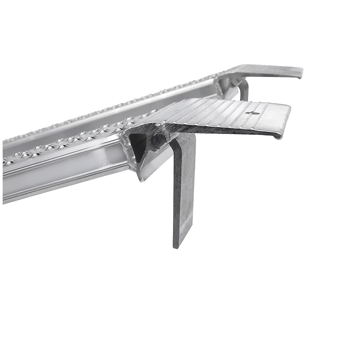 Detailed shot of a silver metal structure with a ribbed surface and angled brackets.