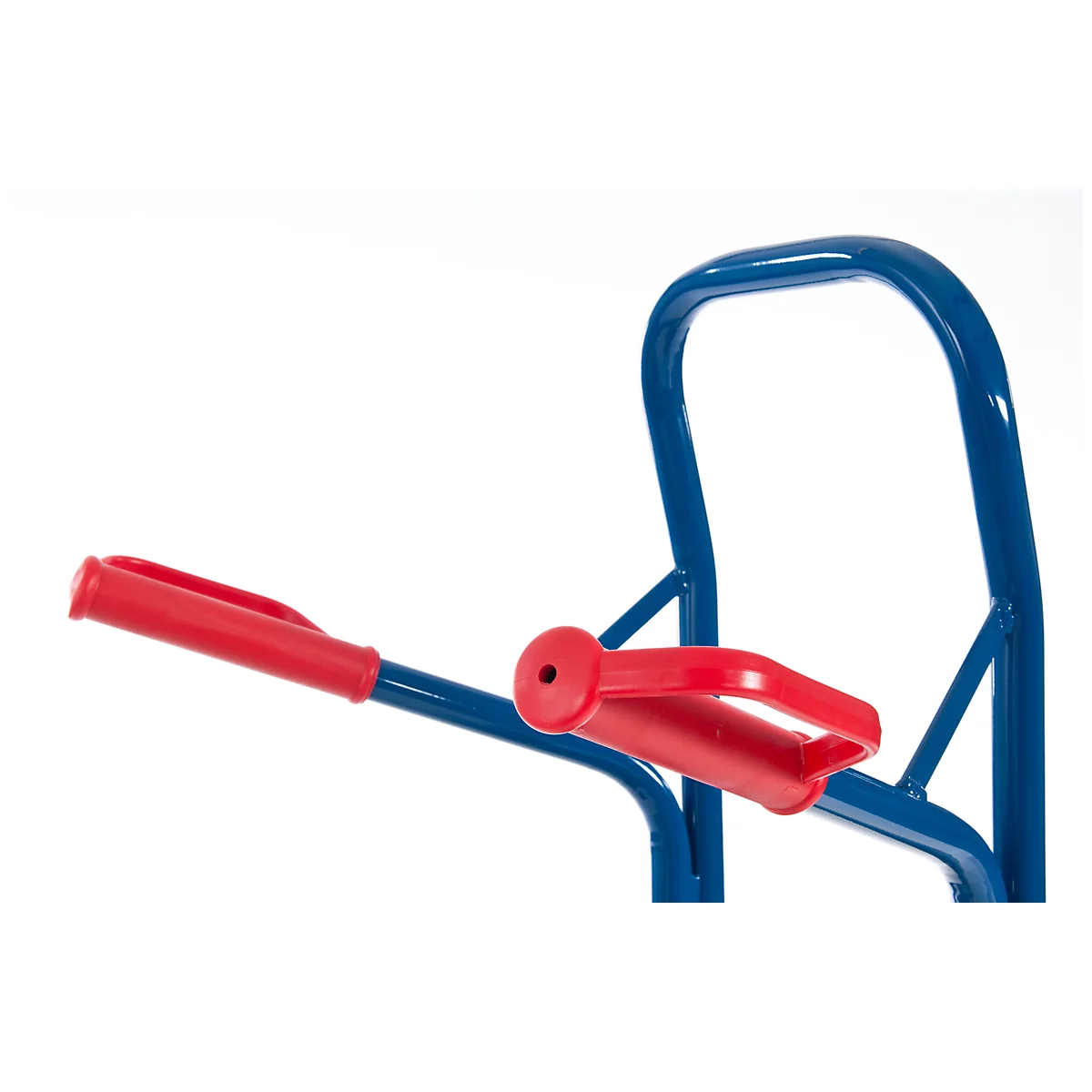 Close-up of a blue wheelbarrow with red handles. The handles and frame are clearly visible.