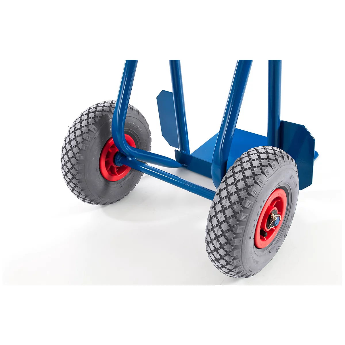 Close-up of a blue hand truck with gray tires and red rims.