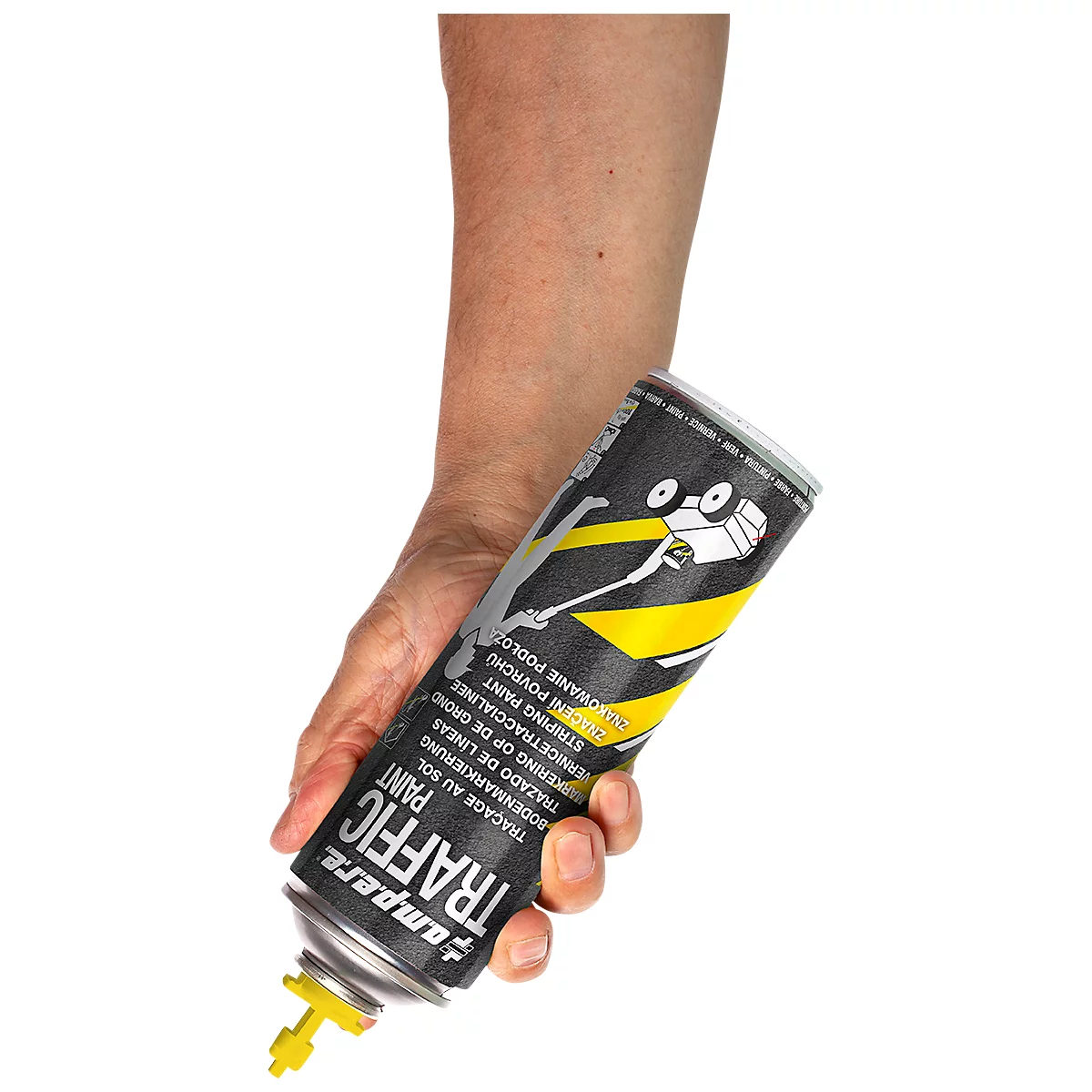 Person holds can of traffic paint, text: Traffic Paint. Yellow nozzle detail. On white background.