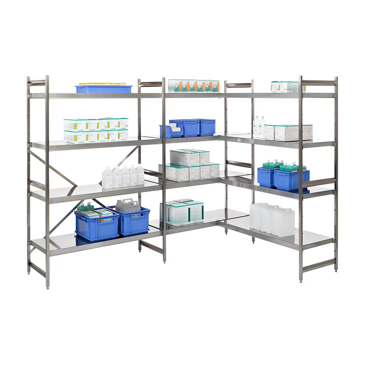 Stainless steel shelving in a lab or industrial setting. Shelves hold containers, boxes, and bottles.