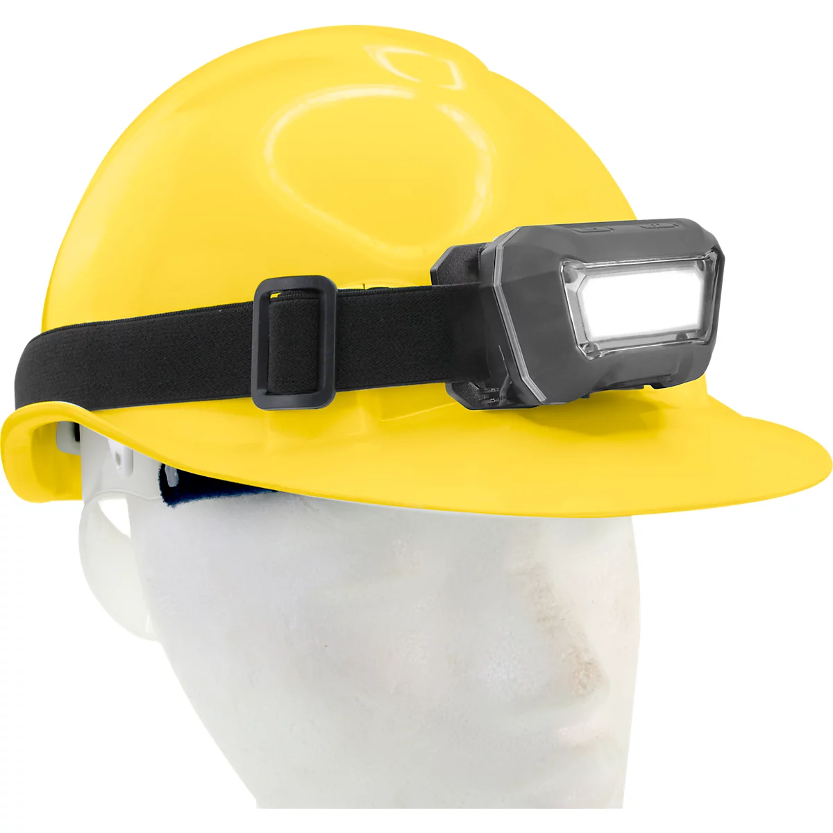 Yellow construction helmet with headlamp. Black band holds the lamp. The light shines brightly.